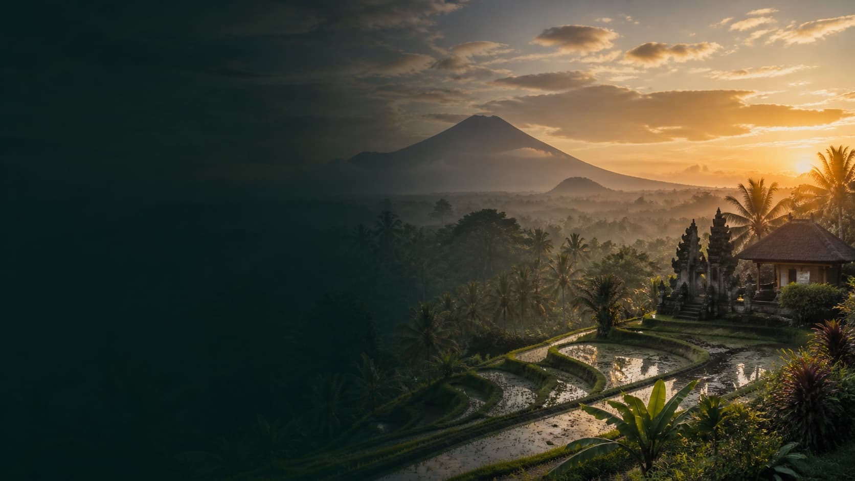 Rice terraces and a Balinese temple beneath a distant volcano at dawn.